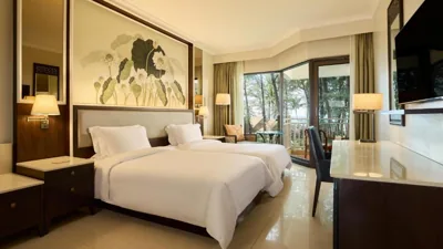 Deluxe doppia con letti singoli e vista mare — Dusit Thani Laguna Phuket